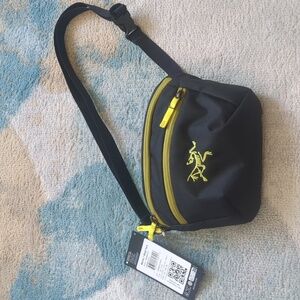 Arc'teryx Black and Yellow Crossbody Bag